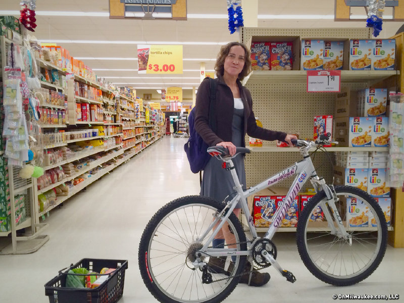 Karen Culver wheels her bike through the store when she doesn't have a lock.
